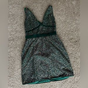 Green with gold sequins dress.